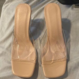 Size 6. Clear, nude color, 2.5 inch heels.
